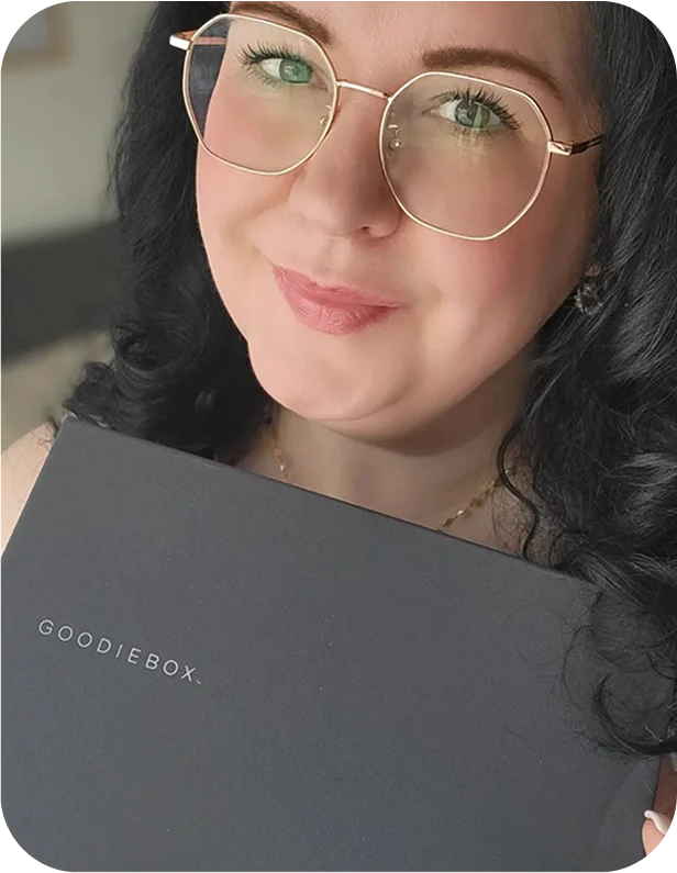 Member holding a Goodiebox delivery