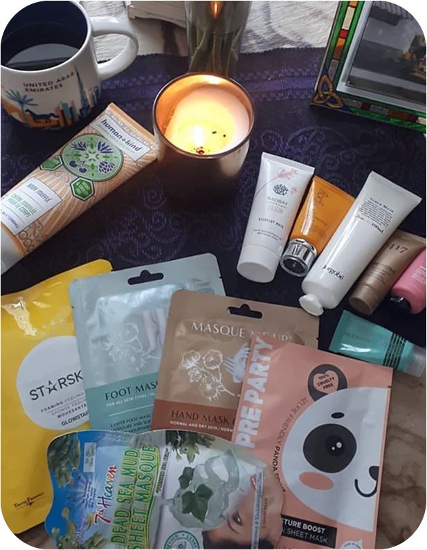 Flat lay of skincare masks and self-care products